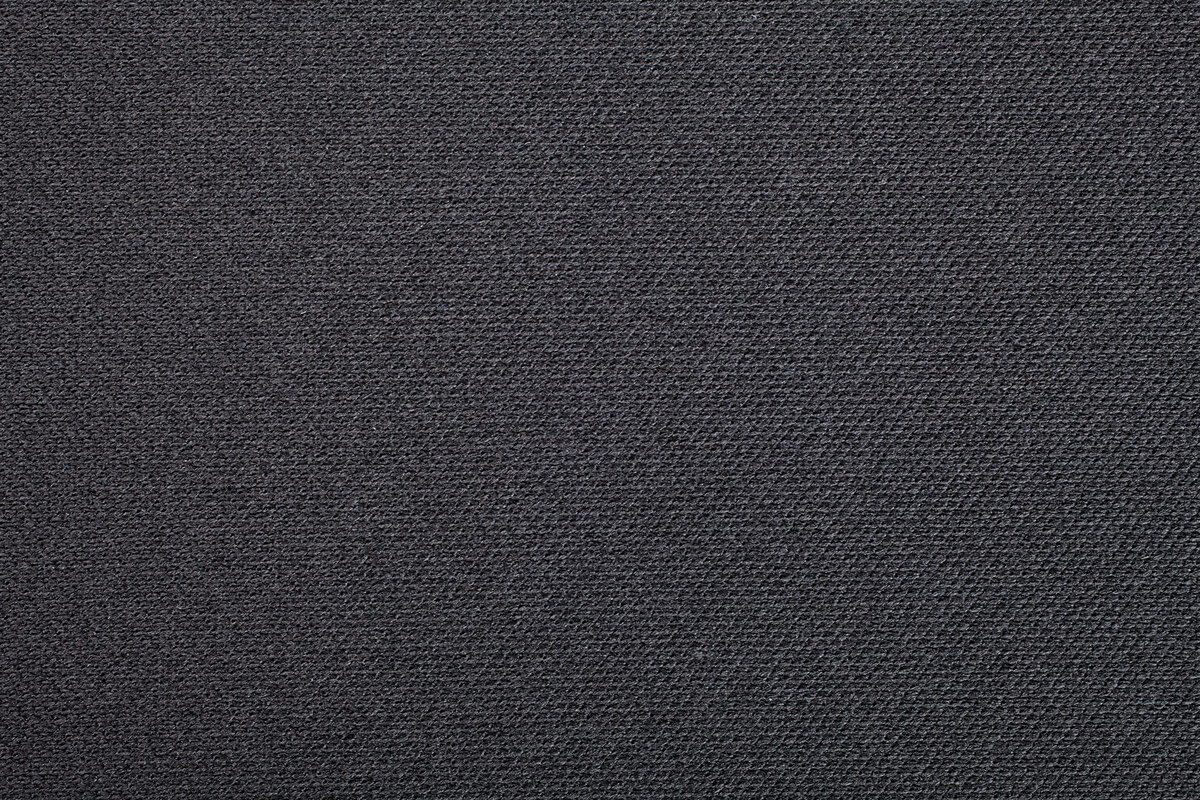 Tissu gris foncé texturé. Gros plan détaillé avec motif tissé.