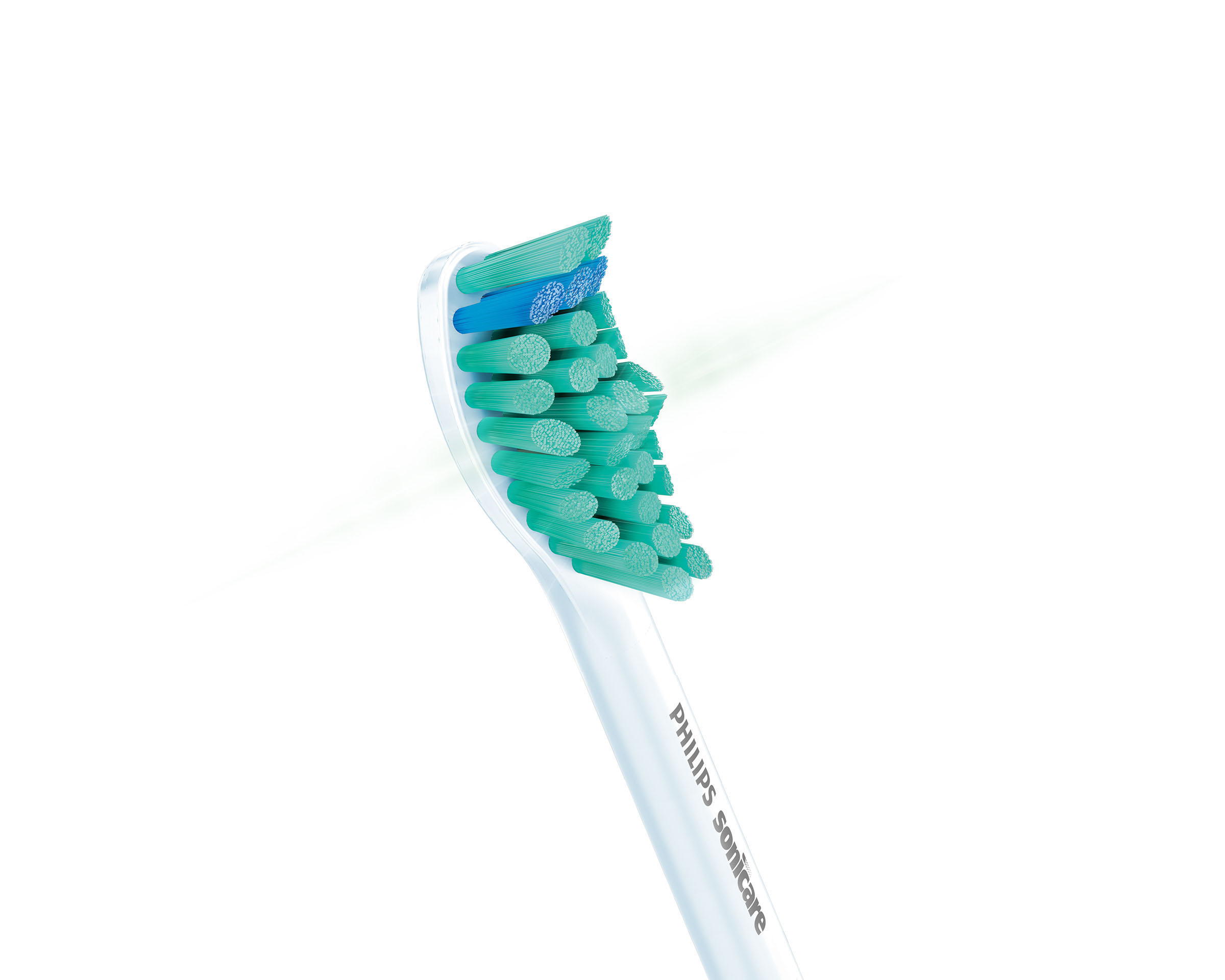 Nahaufnahme eines weißen Philips Sonicare Zahnbürstenkopfes mit grünen und blauen Borsten.