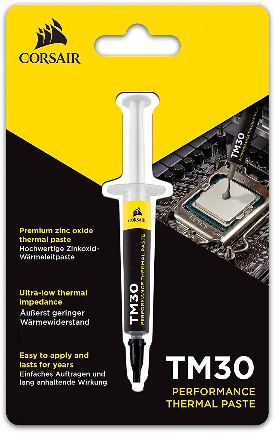 Eine Tube Wärmeleitpaste mit Spritzenapplikator, verpackt in Gelb und Schwarz.