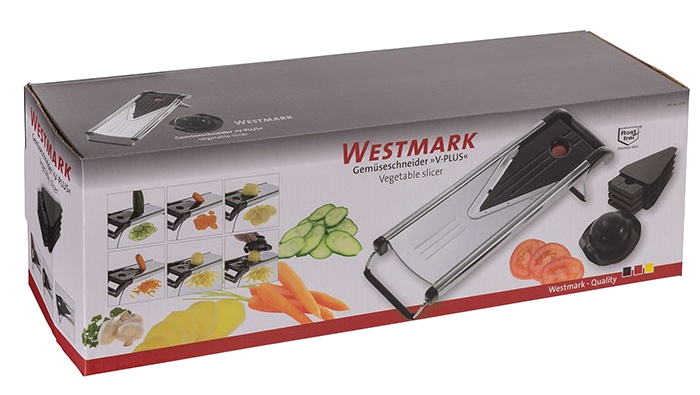 Zöldségszeletelő dobozban. A doboz a szeletelőt, zöldségeket és a WESTMARK márkanevet mutatja.