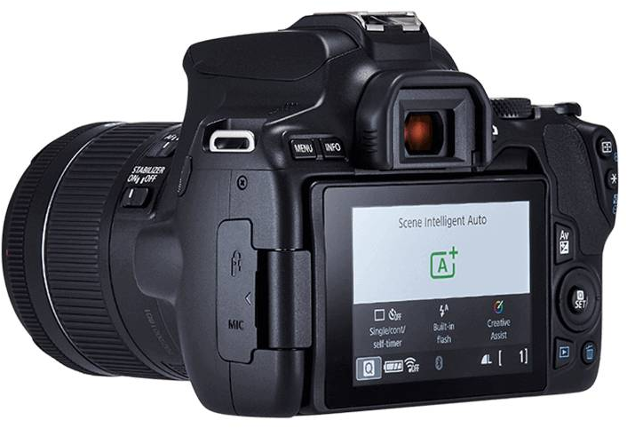 Appareil photo Canon avec un écran affichant une interface. L'appareil a divers boutons et réglages.