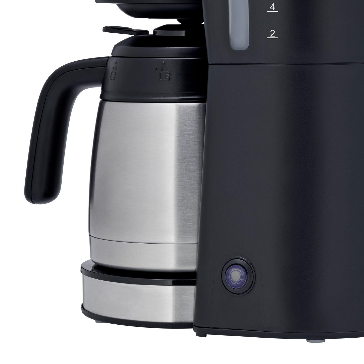 Schwarze und silberne Kaffeemaschine mit Edelstahlkanne und Ein-/Aus-Taste.