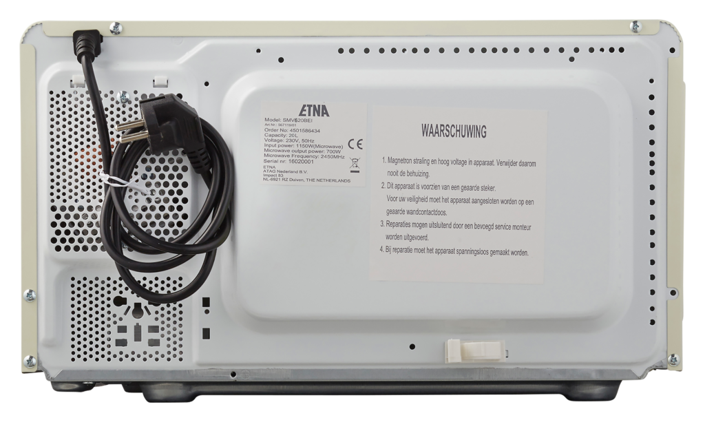 Rear view of a white microwave with a power cord and a warning label.