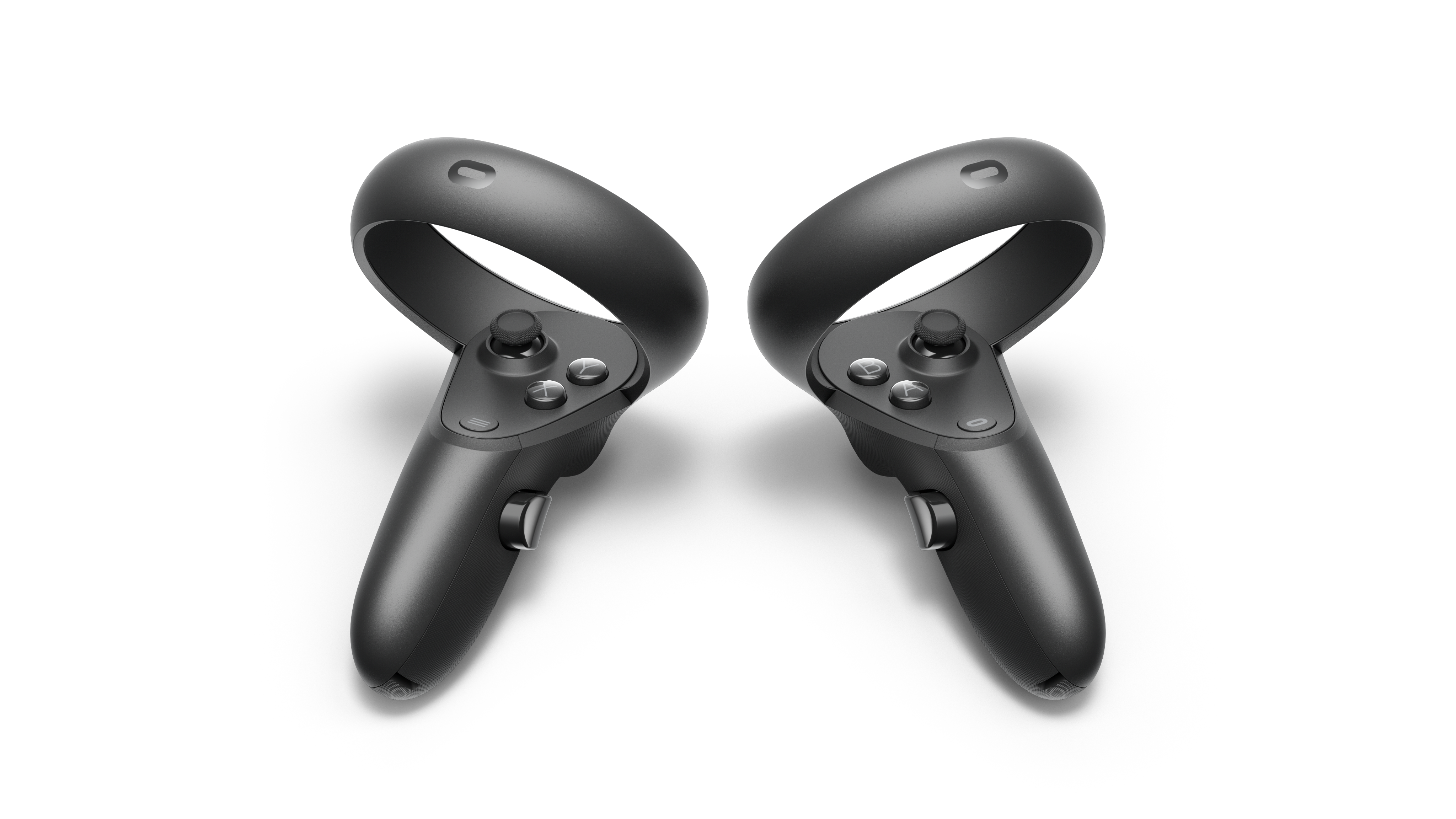 Zwei schwarze VR-Controller auf weißem Untergrund.