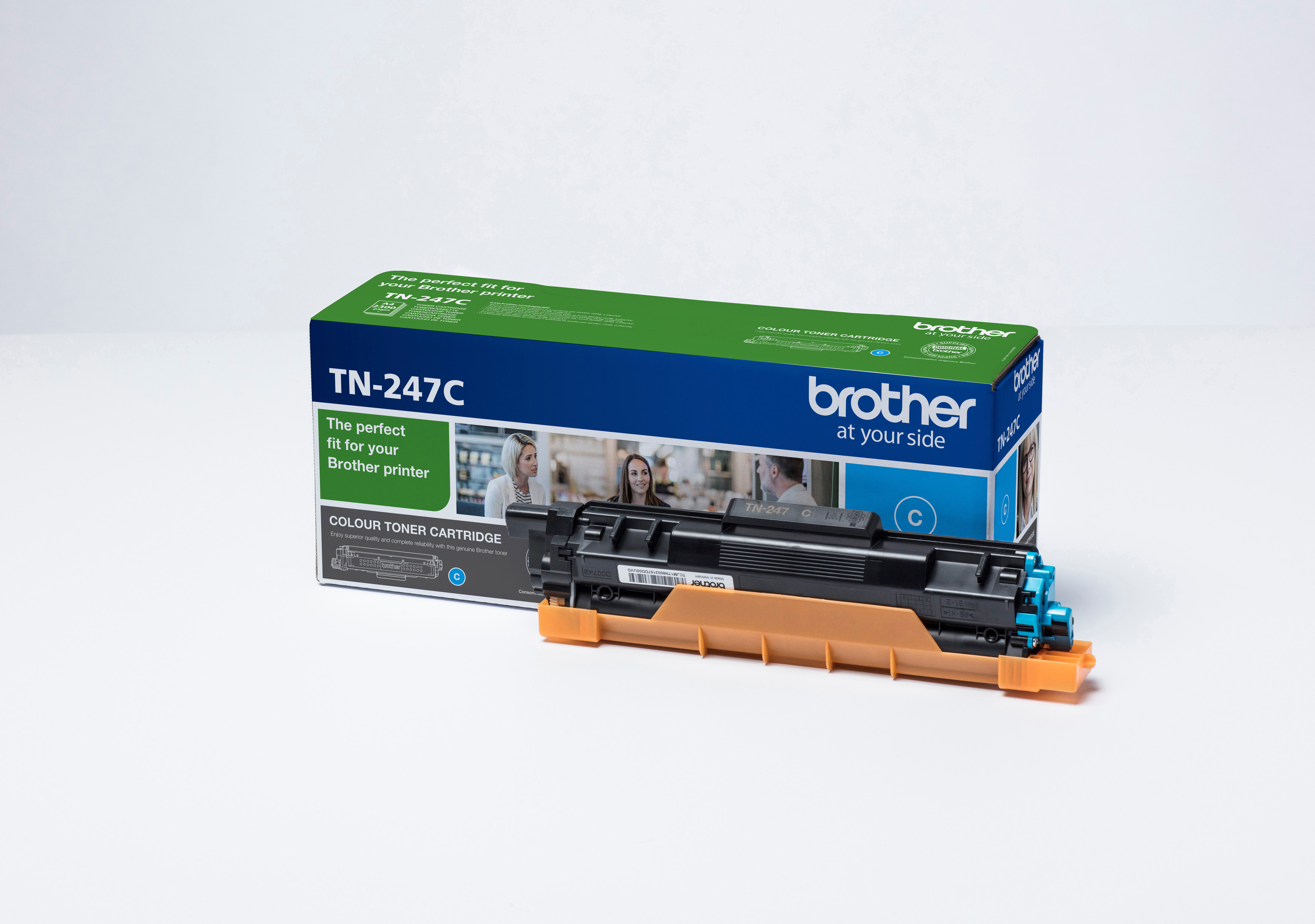Brother TN-247C Tonerkartusche in der Box. Die Box hat ein blaues und grünes Design.