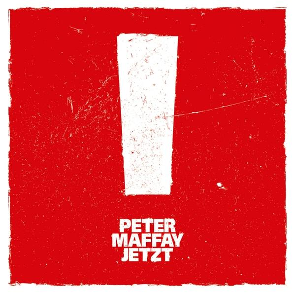 Ein rotes Poster mit einem weißen Ausrufezeichen und dem Text 'PETER MAFFAY JETZT'.