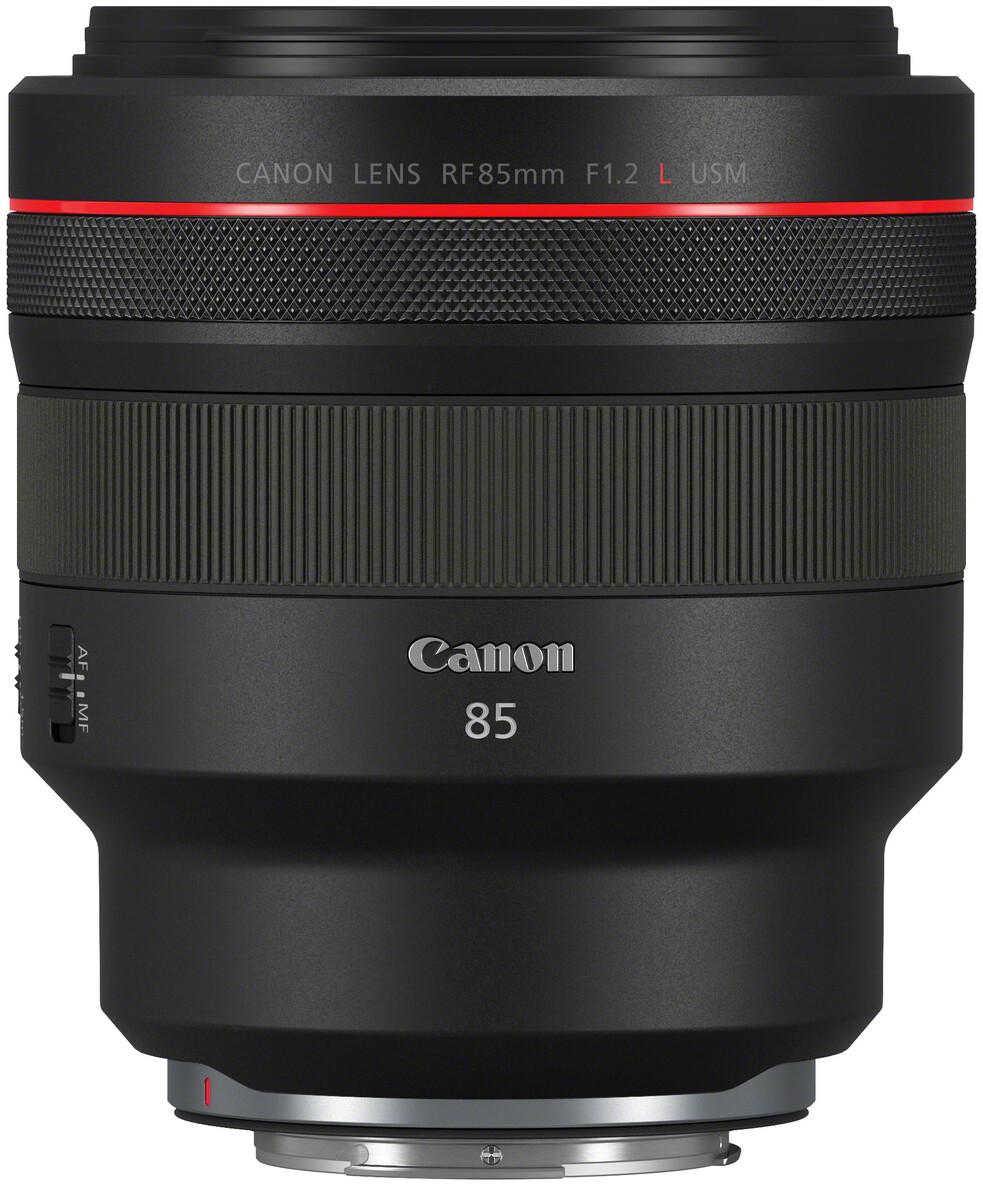 Ein Canon RF 85mm F1.2 L USM Objektiv. Es ist schwarz mit einem roten Ring, und das Canon-Logo ist sichtbar. Das Objektiv hat gerippte und strukturierte Abschnitte.