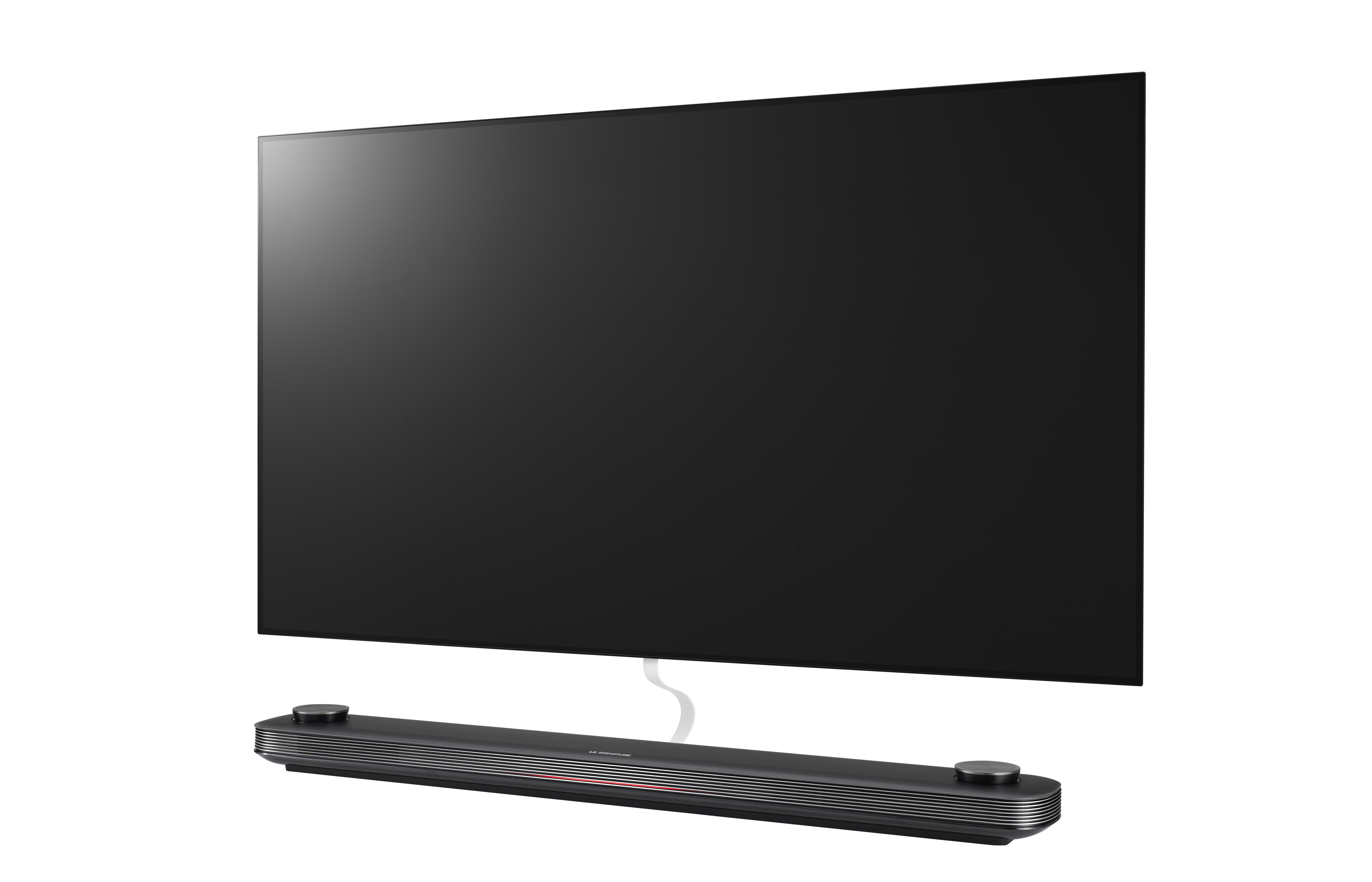 Un televisor negro grande con una barra de sonido debajo, cable blanco y fondo blanco.
