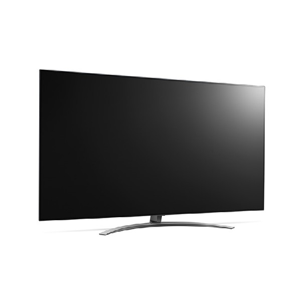 Un televisor grande con base curva. Tiene una pantalla negra y un soporte plateado.