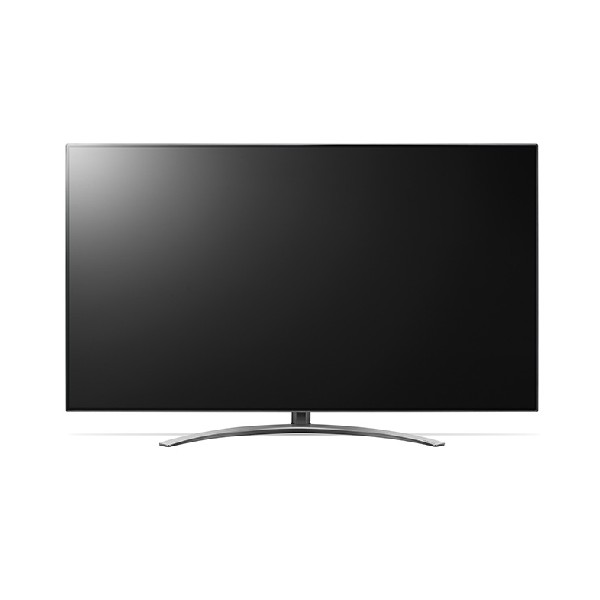 Televisor negro grande sobre un soporte. Base plateada curvada. Fondo blanco.
