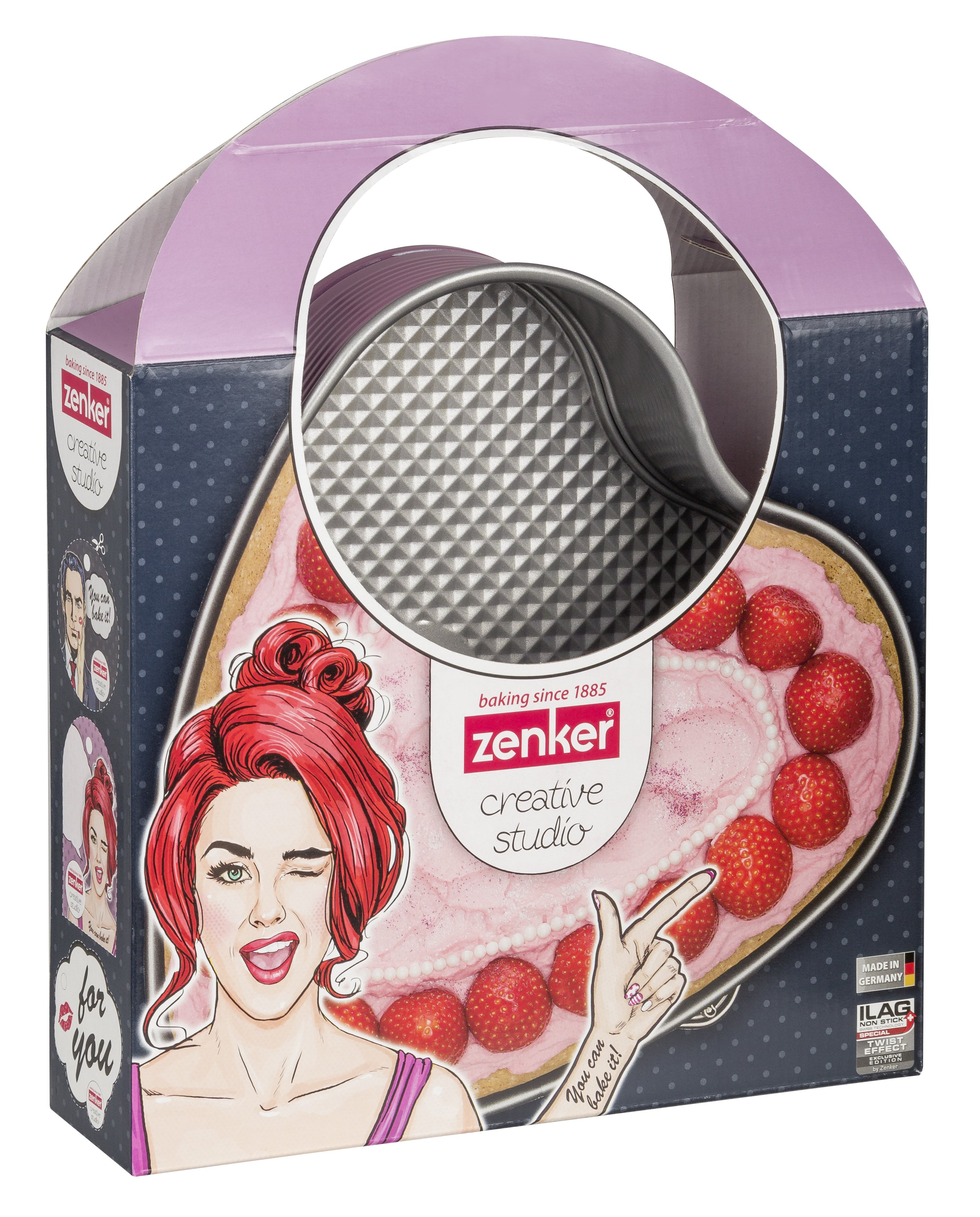 Herzförmiger Kuchen in einer Backform auf einer Schachtel mit einer Frauenillustration darauf.