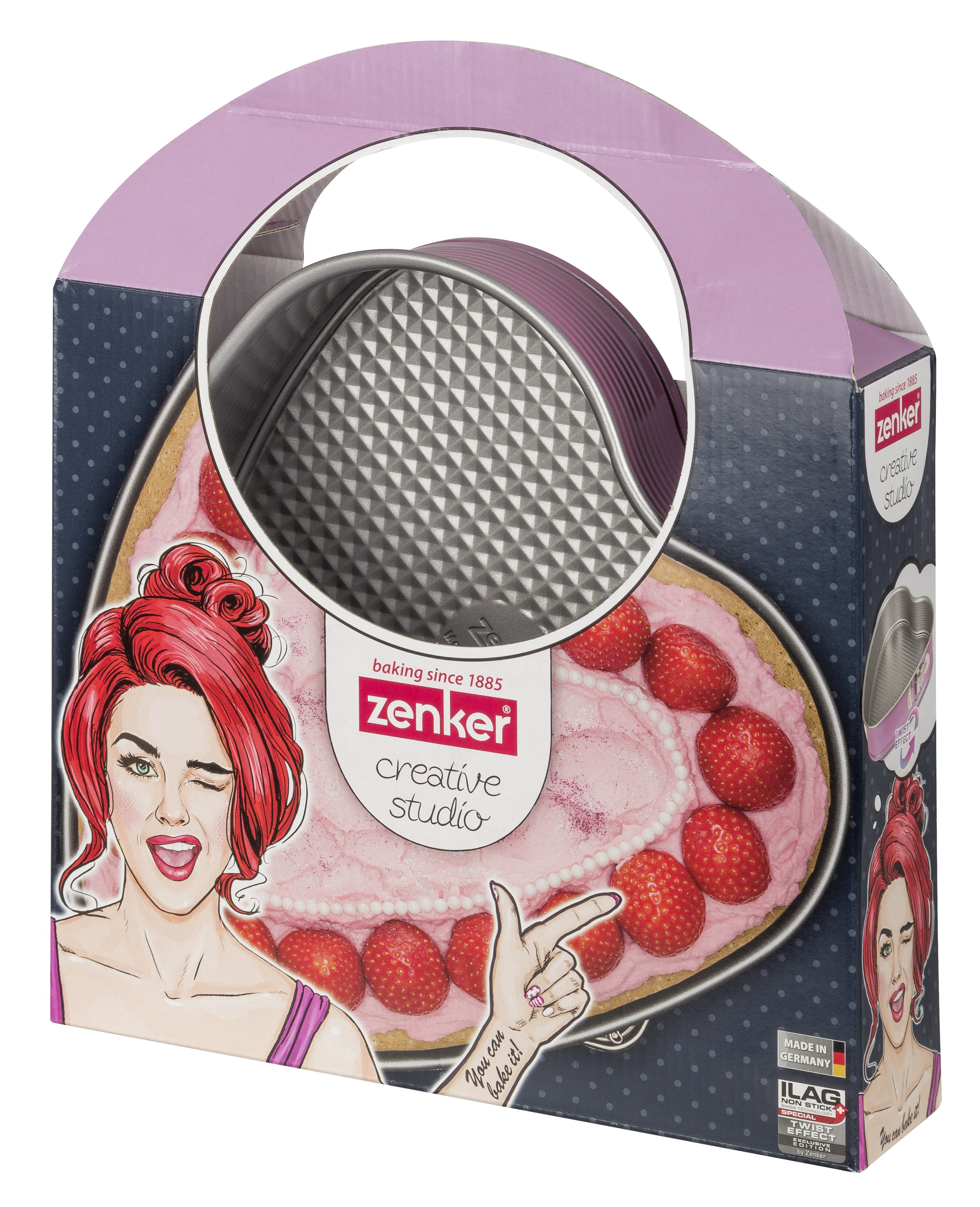 Ein herzförmiger Kuchen in einer Box mit einer zwinkernden Frau.