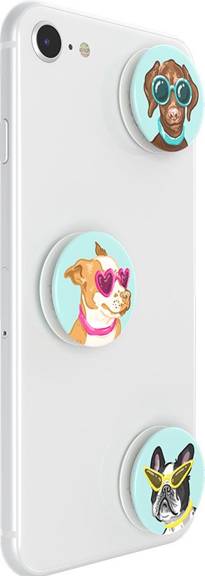 Téléphone blanc avec plusieurs PopSockets sur le thème des chiens, chacun avec une image de chien.