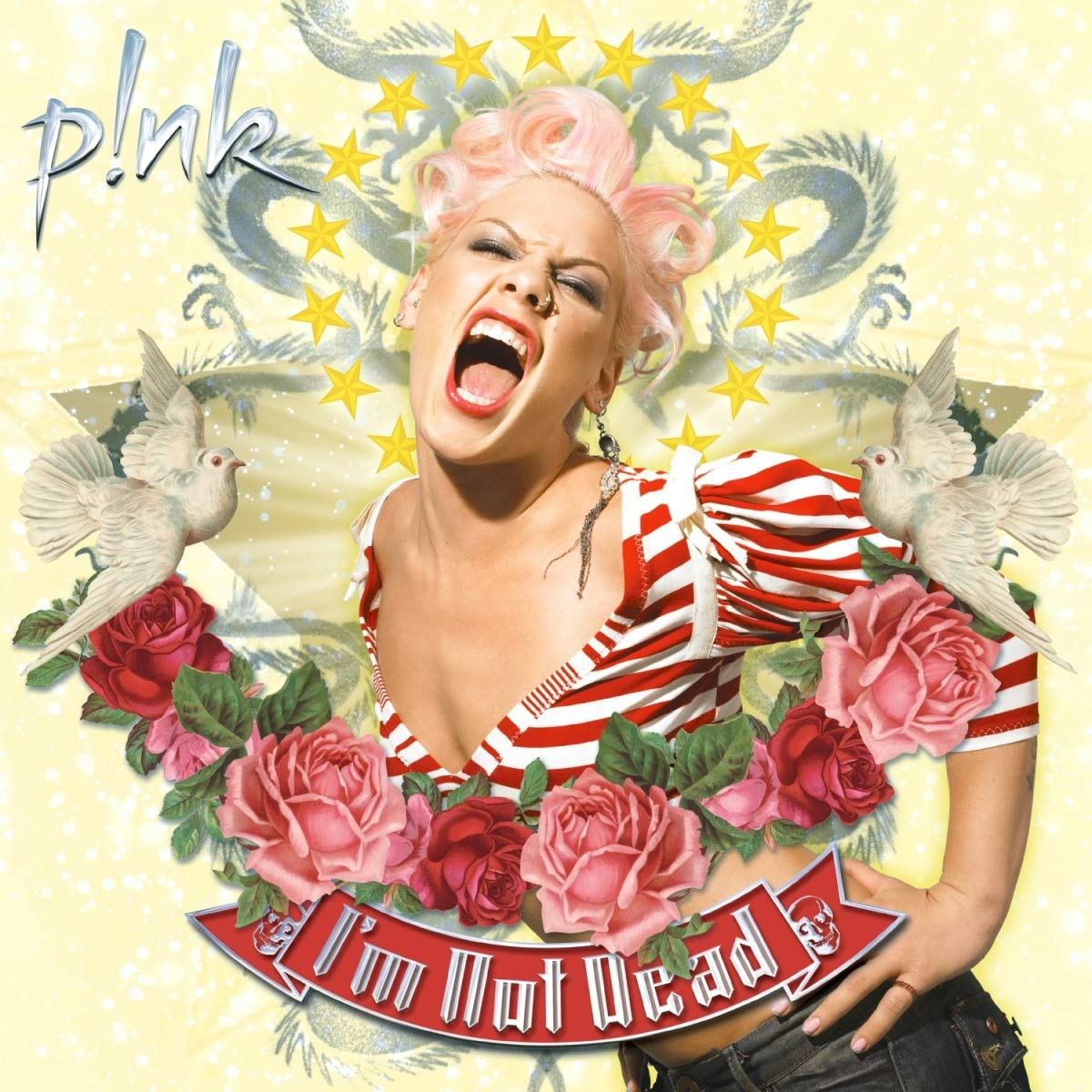 Pink album borító. Pink hajú énekesnő nyitott szájjal, rózsákkal és galambokkal. Sárga háttér csillagokkal.