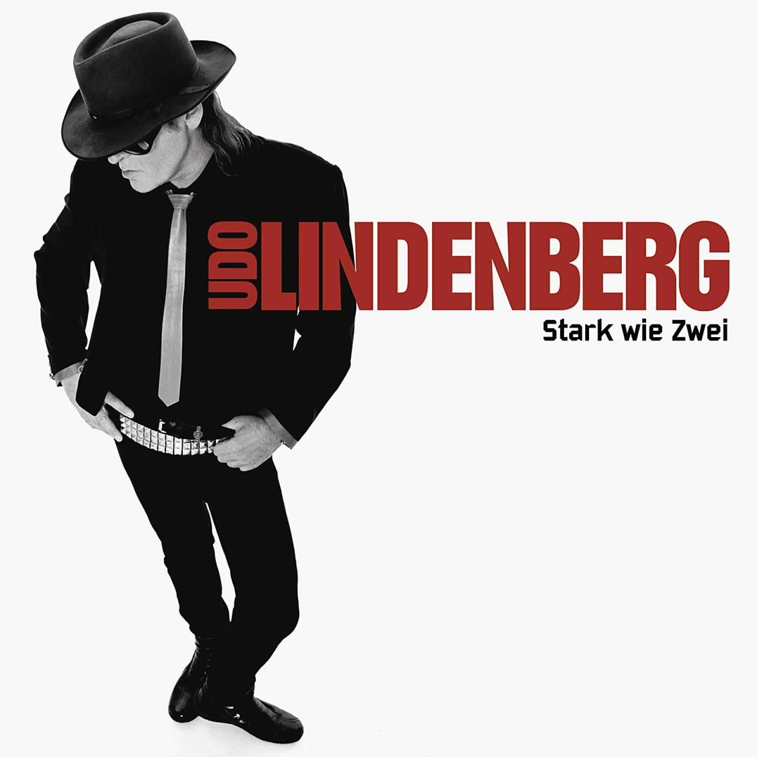 Udo Lindenberg Albumcover. Mann in schwarzem Anzug, Hut und Krawatte, vor weißem Hintergrund.