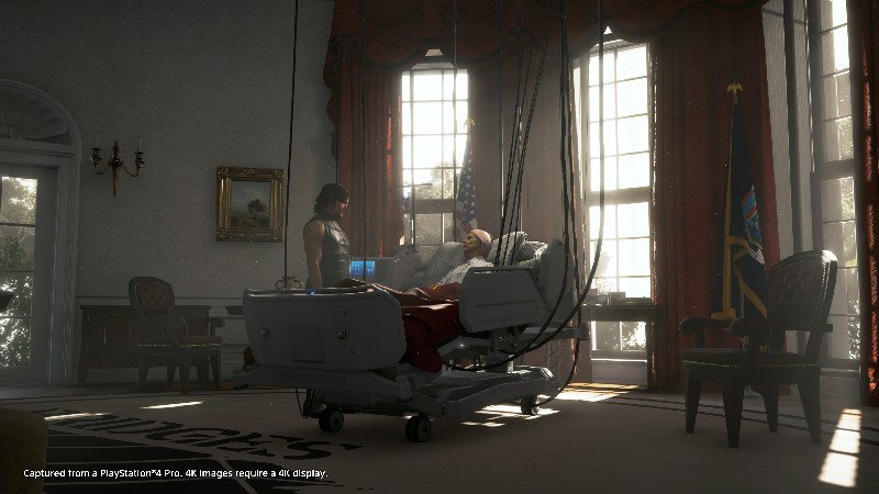 Escena interior con hombre, enfermo en cama, banderas americana y estatal. Sombras.