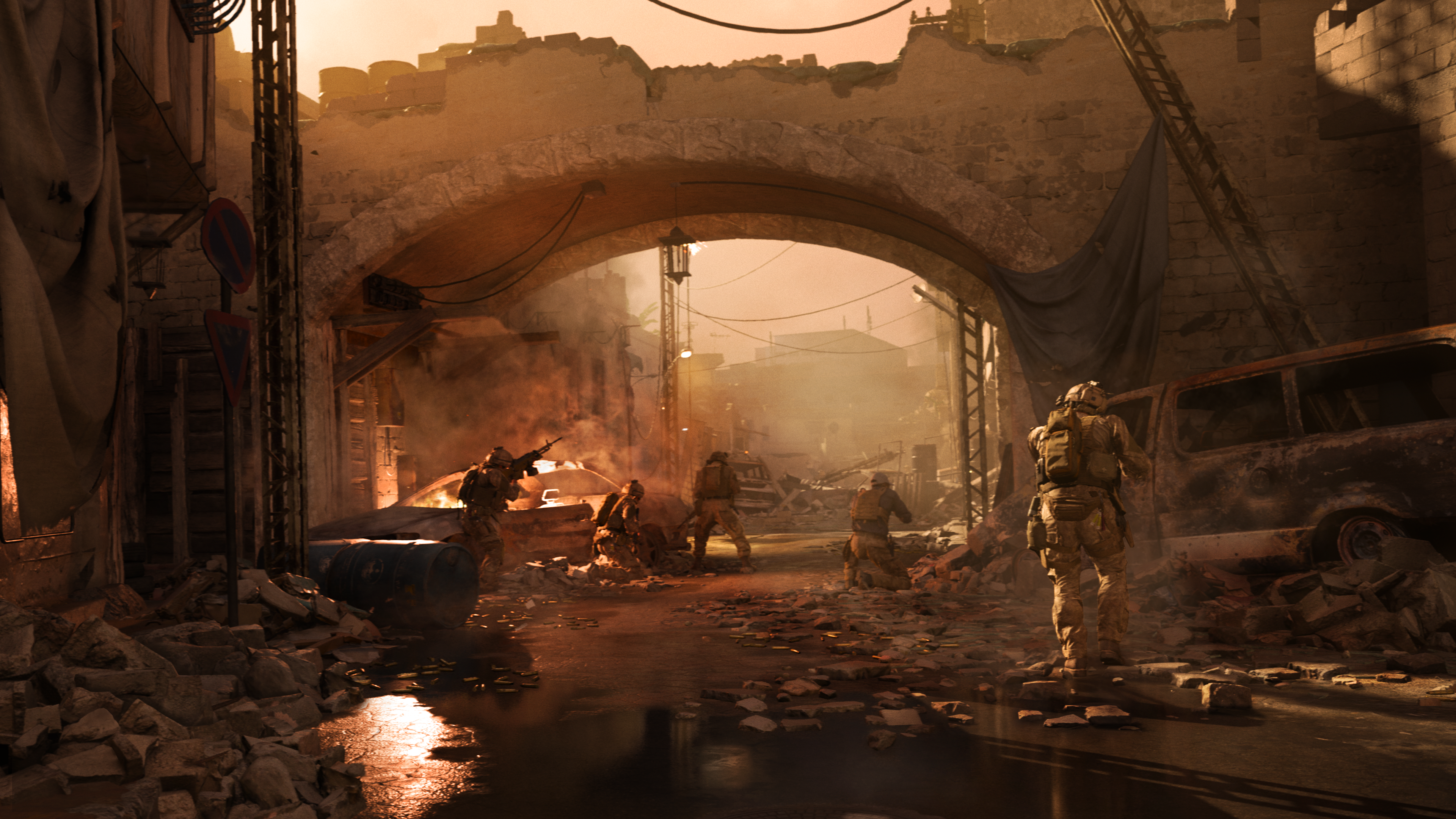Call of Duty Spielszene. Soldaten in einer kriegszerstörten, staubigen Straße. Torbogen im Hintergrund.