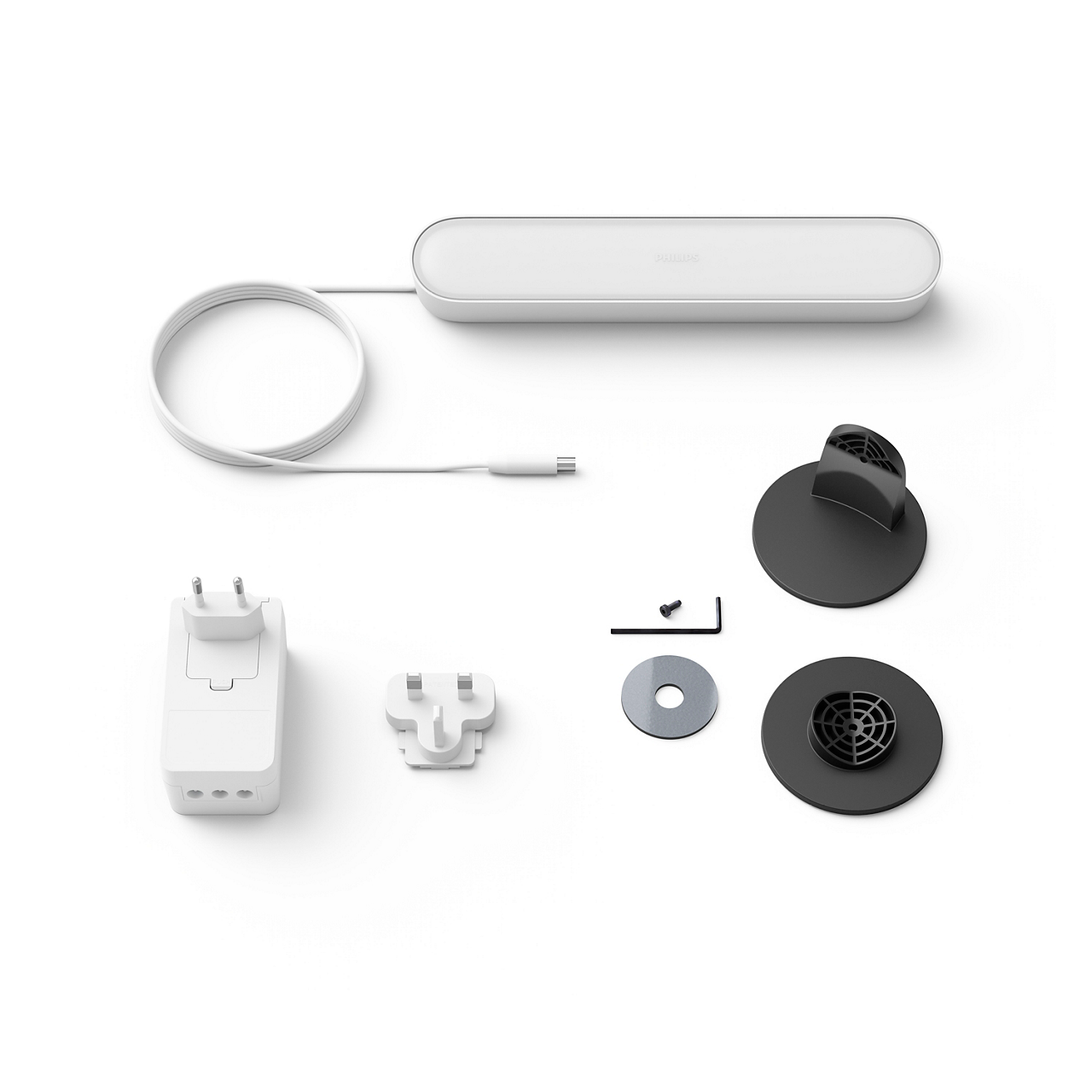 Philips Hue light bar components, including the bar, power supply, and mounting accessories.