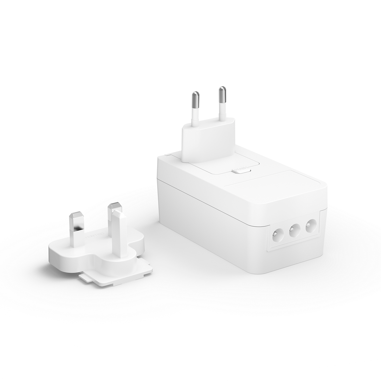 A white power adapter with plug options. The plug is next to the adapter.