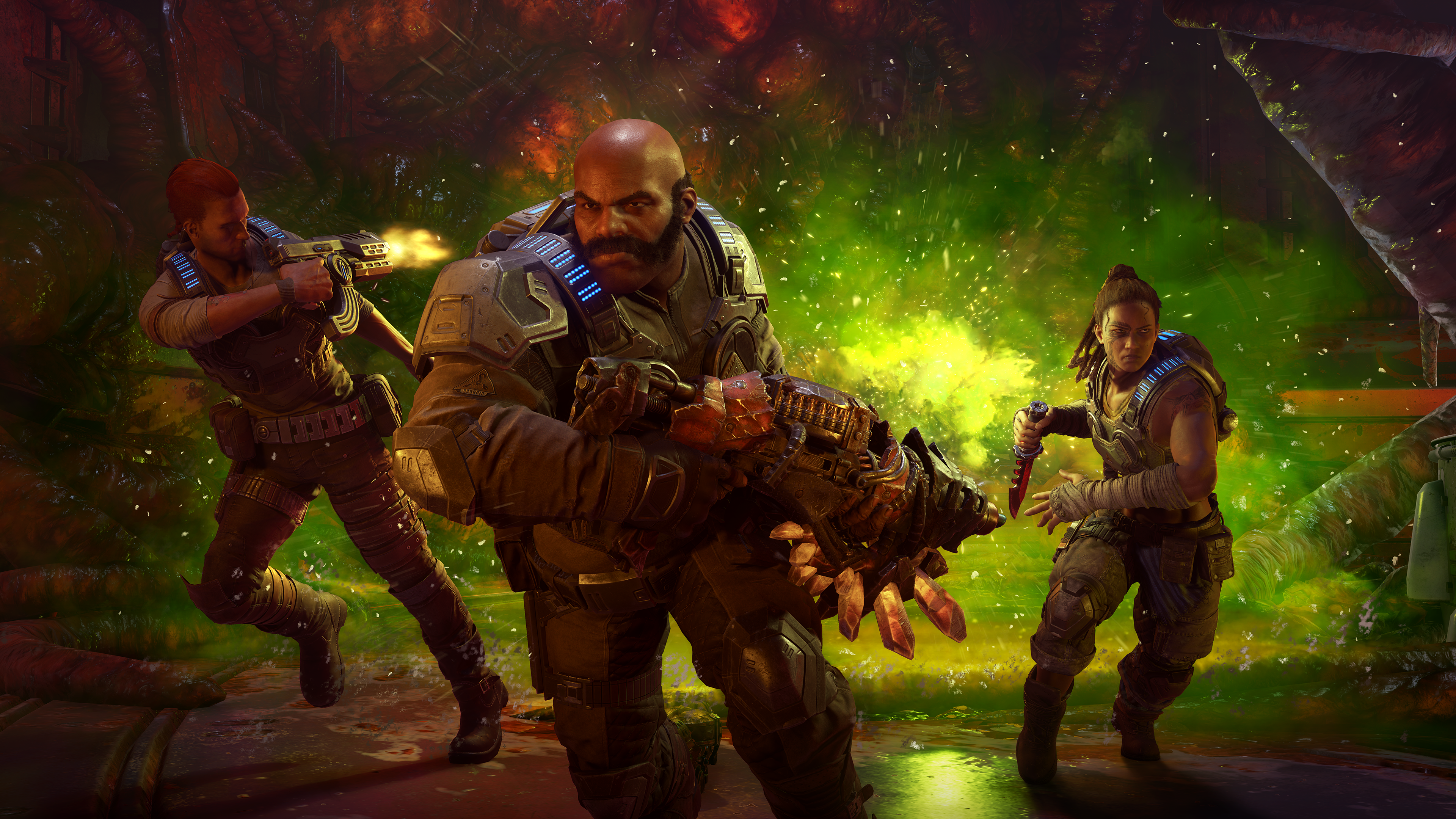 Trois personnages dans une scène de jeu avec des armes, visant quelque chose. Explosions et feu en arrière-plan.