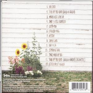 Rückseite einer CD-Hülle mit Titelliste und Blumen.