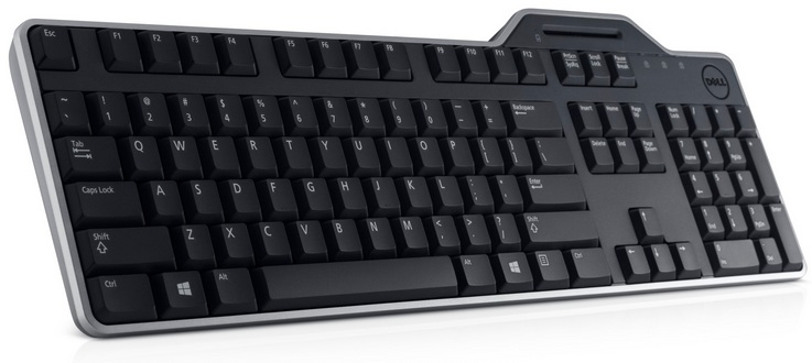 Eine Dell-Tastatur mit schwarzen Tasten und silberner Umrandung wird angezeigt. Die Tasten haben weiße Buchstaben und Symbole. Das Dell-Logo ist sichtbar.