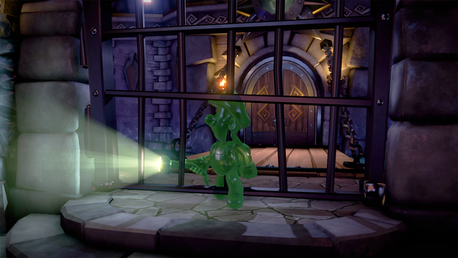 Een groen spookachtig figuur in een kerker, met een zaklamp.