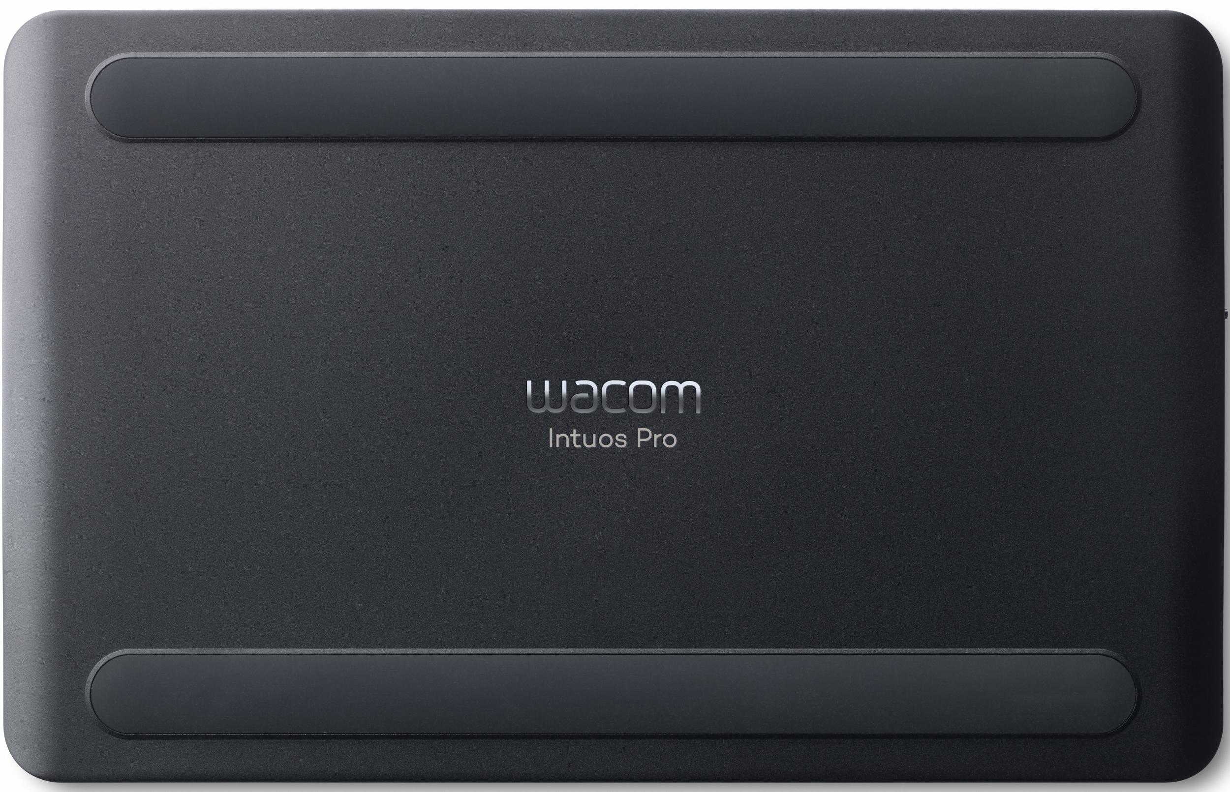 Schwarzes Wacom Intuos Pro Tablet, Unterseite. Zwei Gummistreifen, Wacom-Logo.