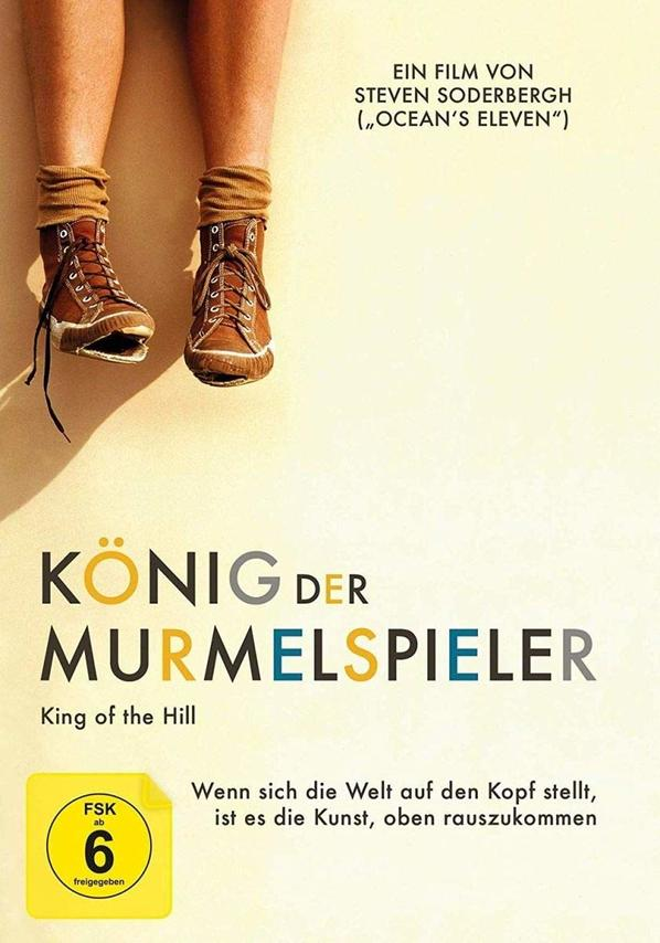 Kinoposter: Beine in Stiefeln. Titel auf Deutsch: König der Murmelspieler.