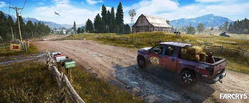 Una camioneta conduciendo por un camino de tierra en un paisaje rural con una granja y cielo azul.