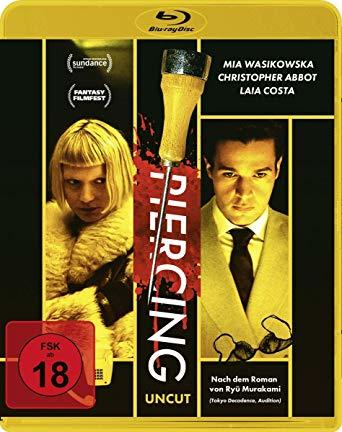 Filmcover. Zeigt eine Frau mit blonden Haaren und einen Mann sowie ein großes rotes Etikett mit 18.