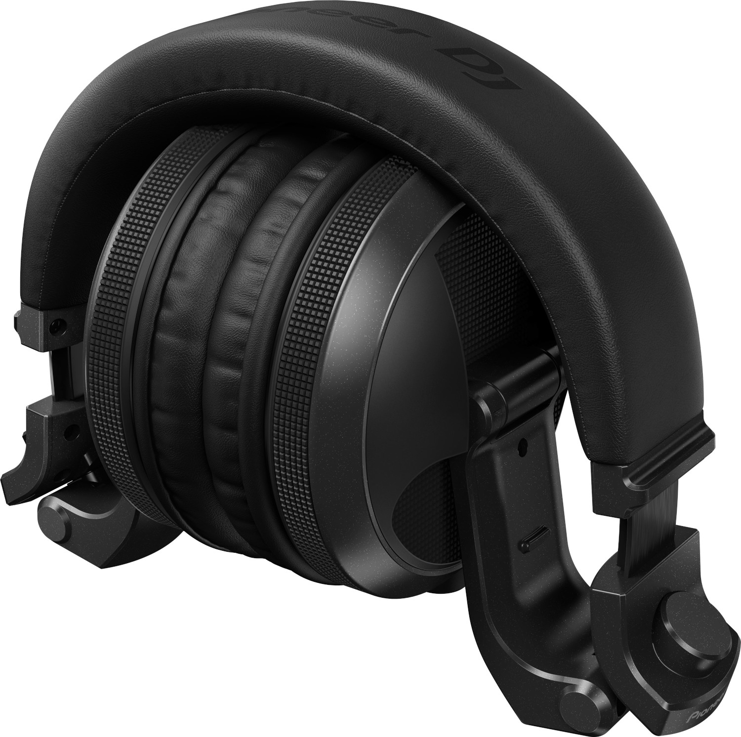 Casque circum-auriculaire noir. Conception fermée avec oreillettes et bandeau visibles.