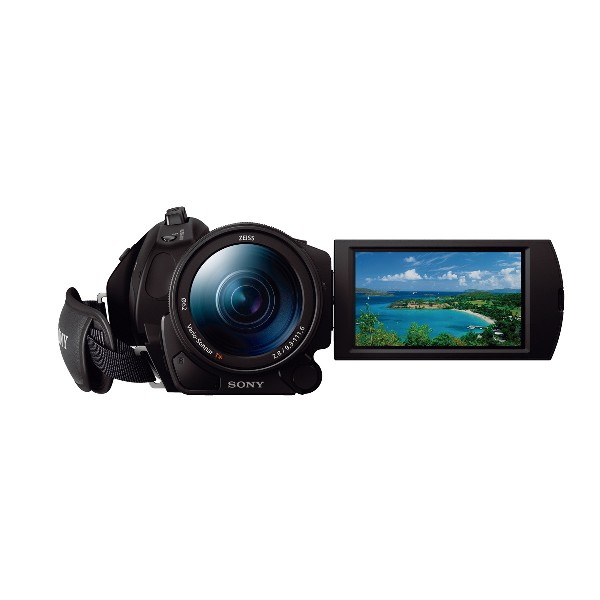 Cámara de video negra con una pantalla que muestra un paisaje costero. La lente dice 'ZEISS'.
