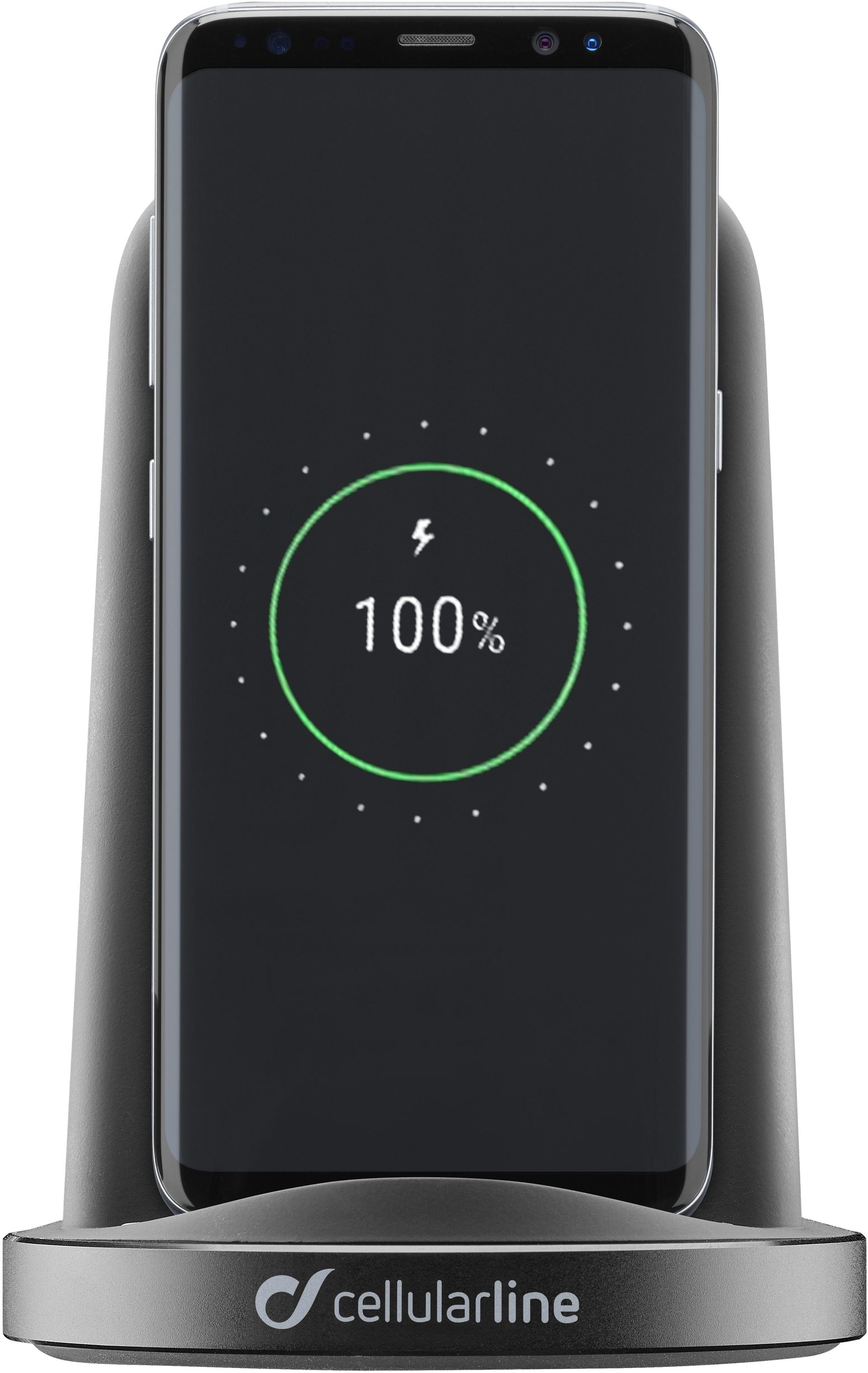 Smartphone in carica wireless su un supporto, mostra 100% carica, display nero.