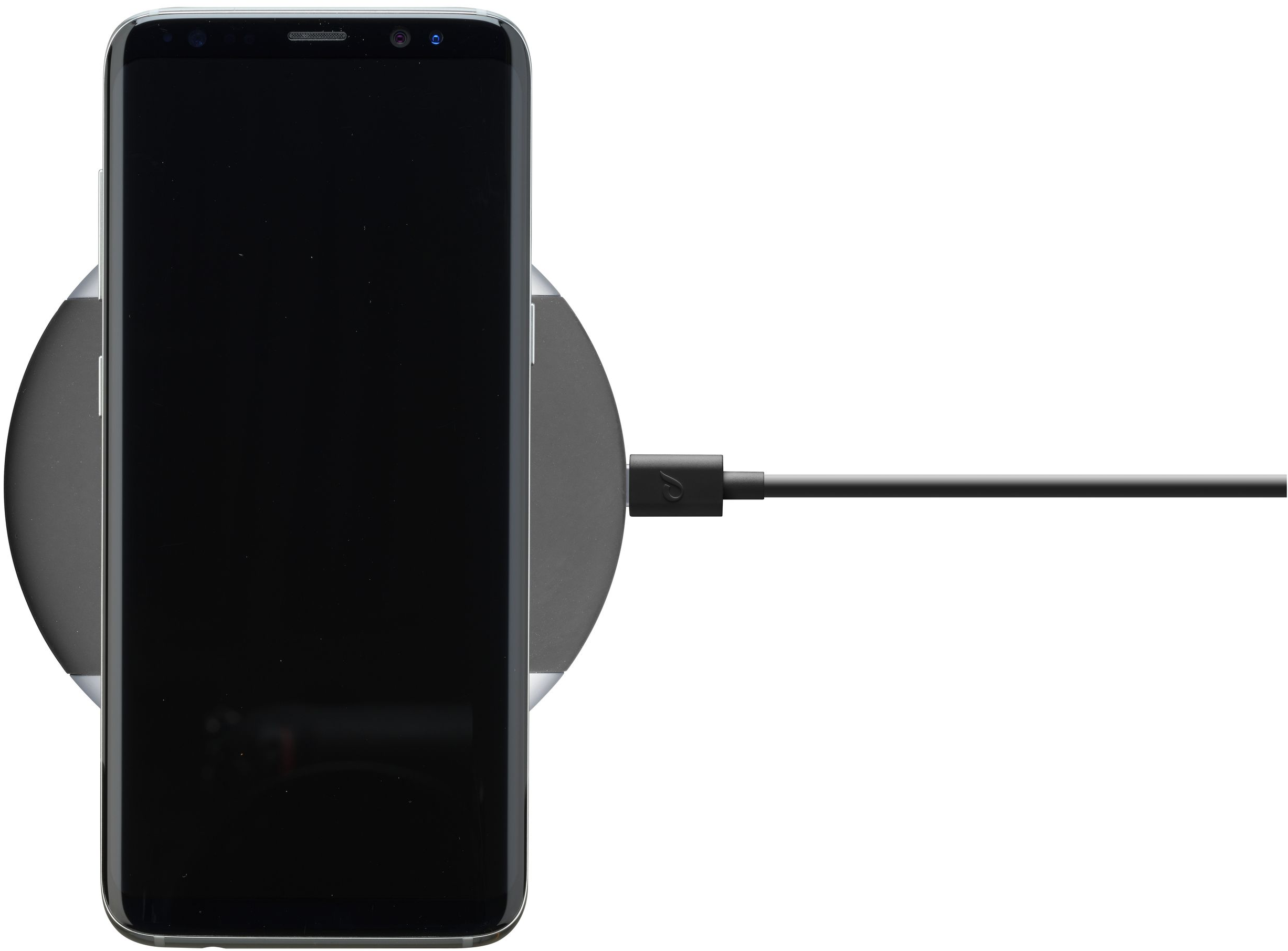 Un caricatore wireless bianco e grigio con uno smartphone nero sopra.