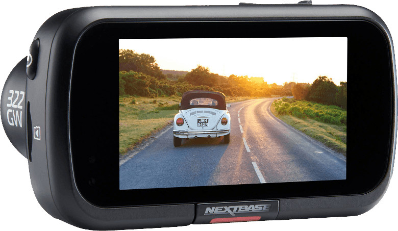 Dashboard camera screen showing a white car on a sunny road, trees in the background.