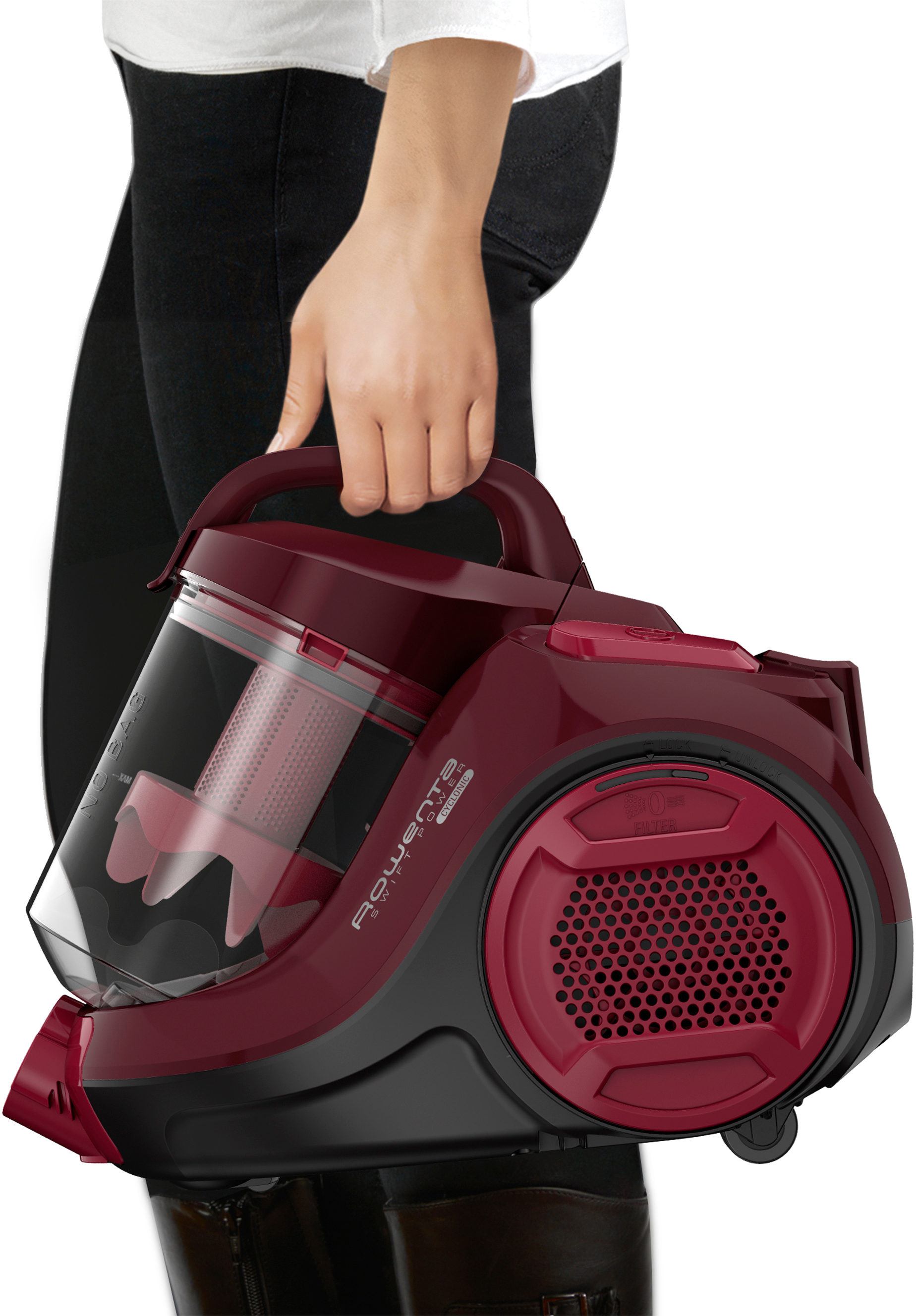 Eine Person hält einen roten Rowenta Staubsauger. Schwarzes und rotes Design.
