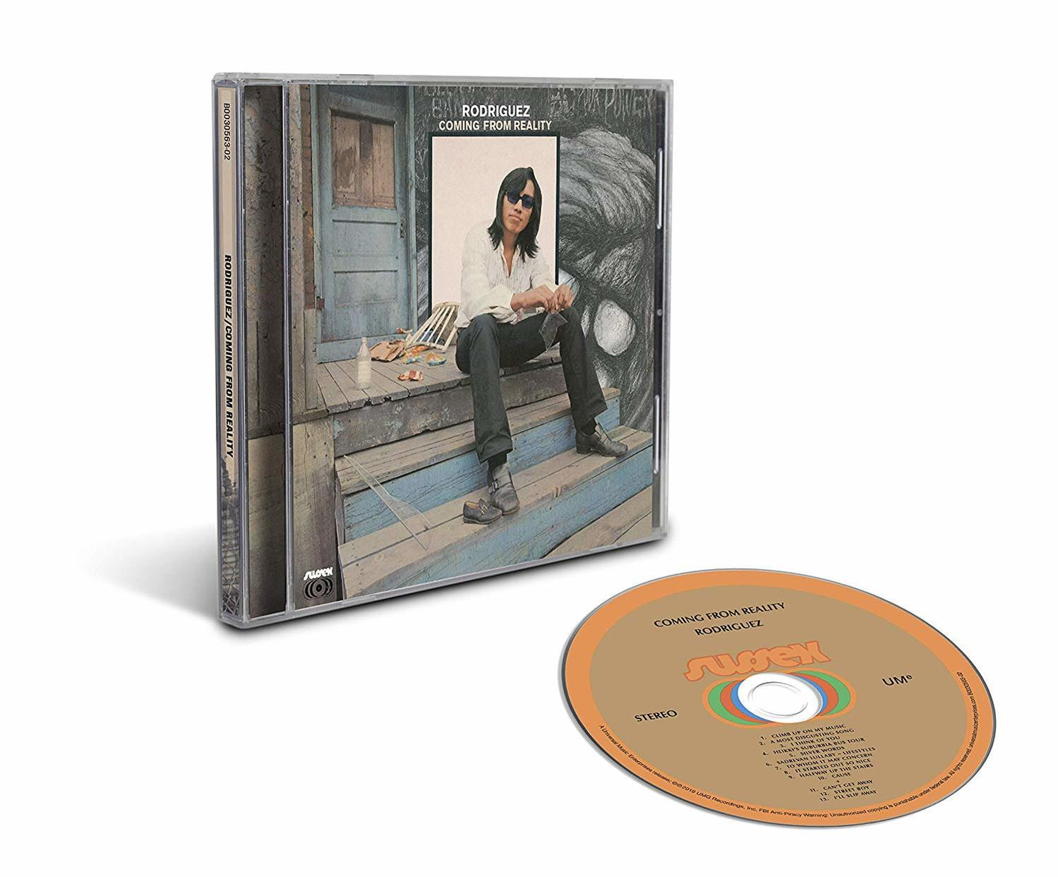 CD-Hülle mit Albumcover eines Mannes auf Treppe, CD mit Albuminfo daneben.