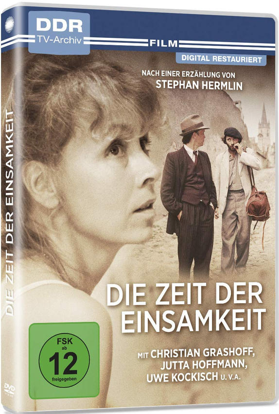 DVD-Cover von 'Die Zeit der Einsamkeit'. Es zeigt eine Frau und zwei Männer in einer Szene.
