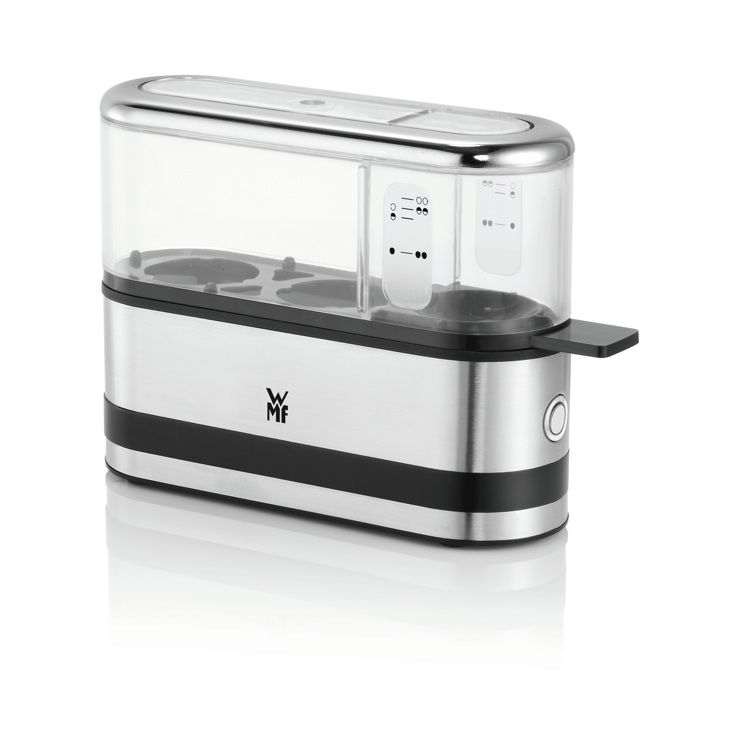 An egg boiler with a silver base and clear top. It is on a white surface.
