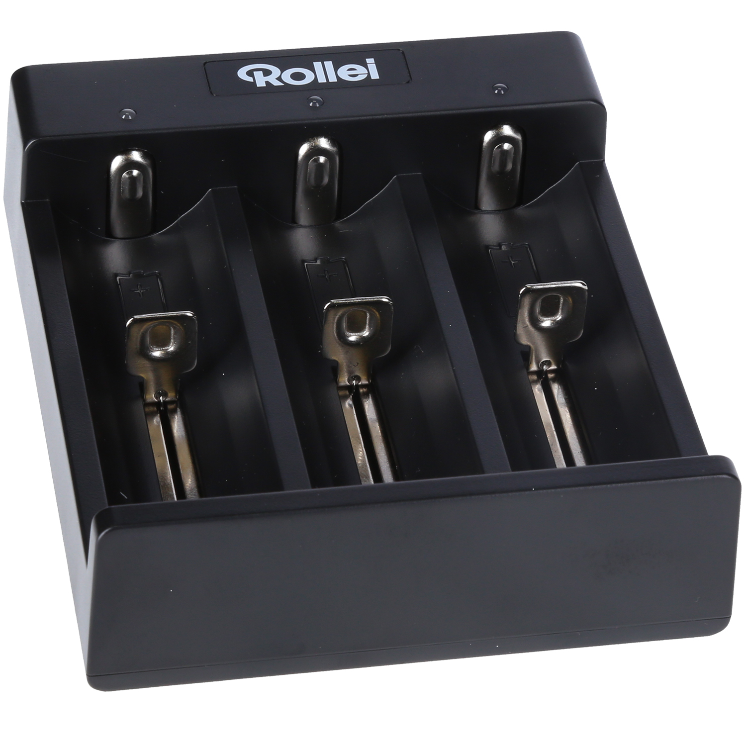 A black charger with three slots and silver metal contacts.
