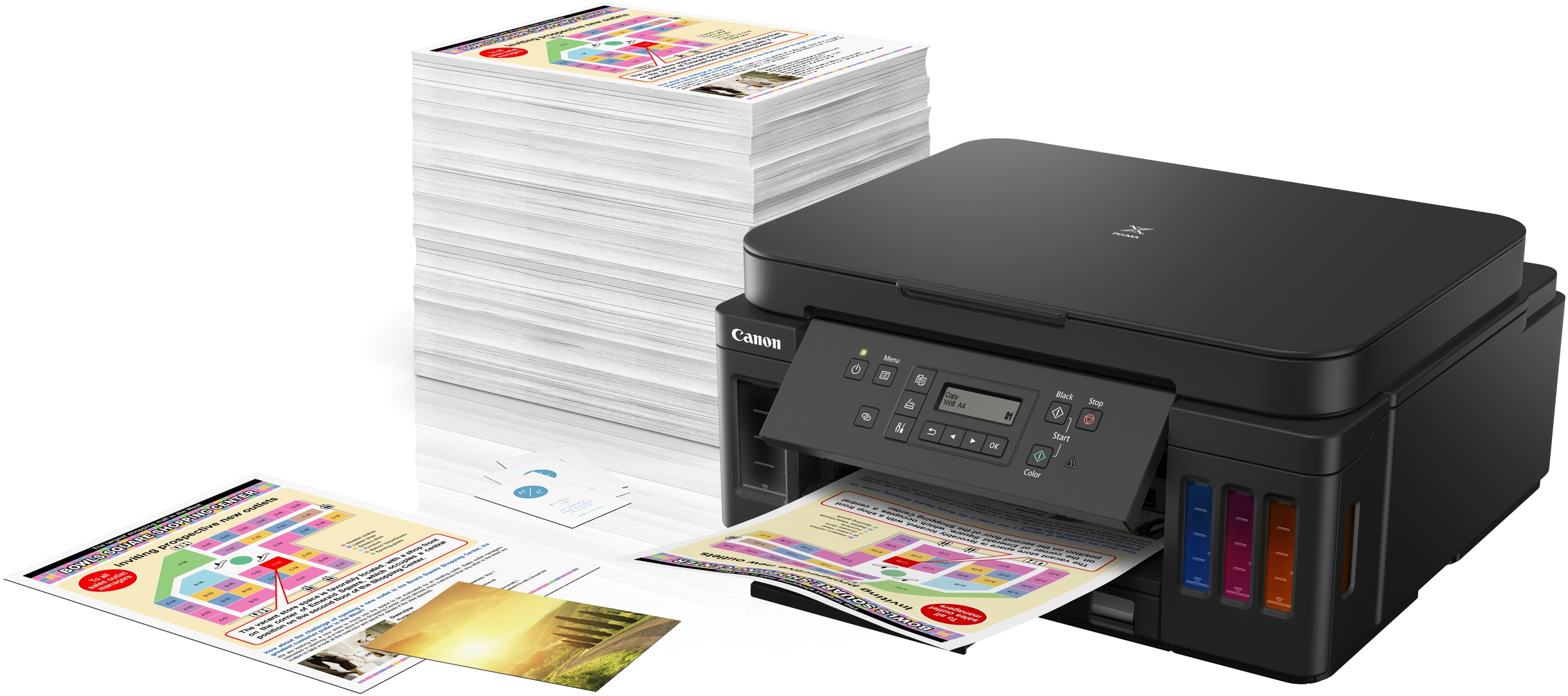 Canon-Drucker druckt. Papierstapel links. Gedruckte Seiten vorne.
