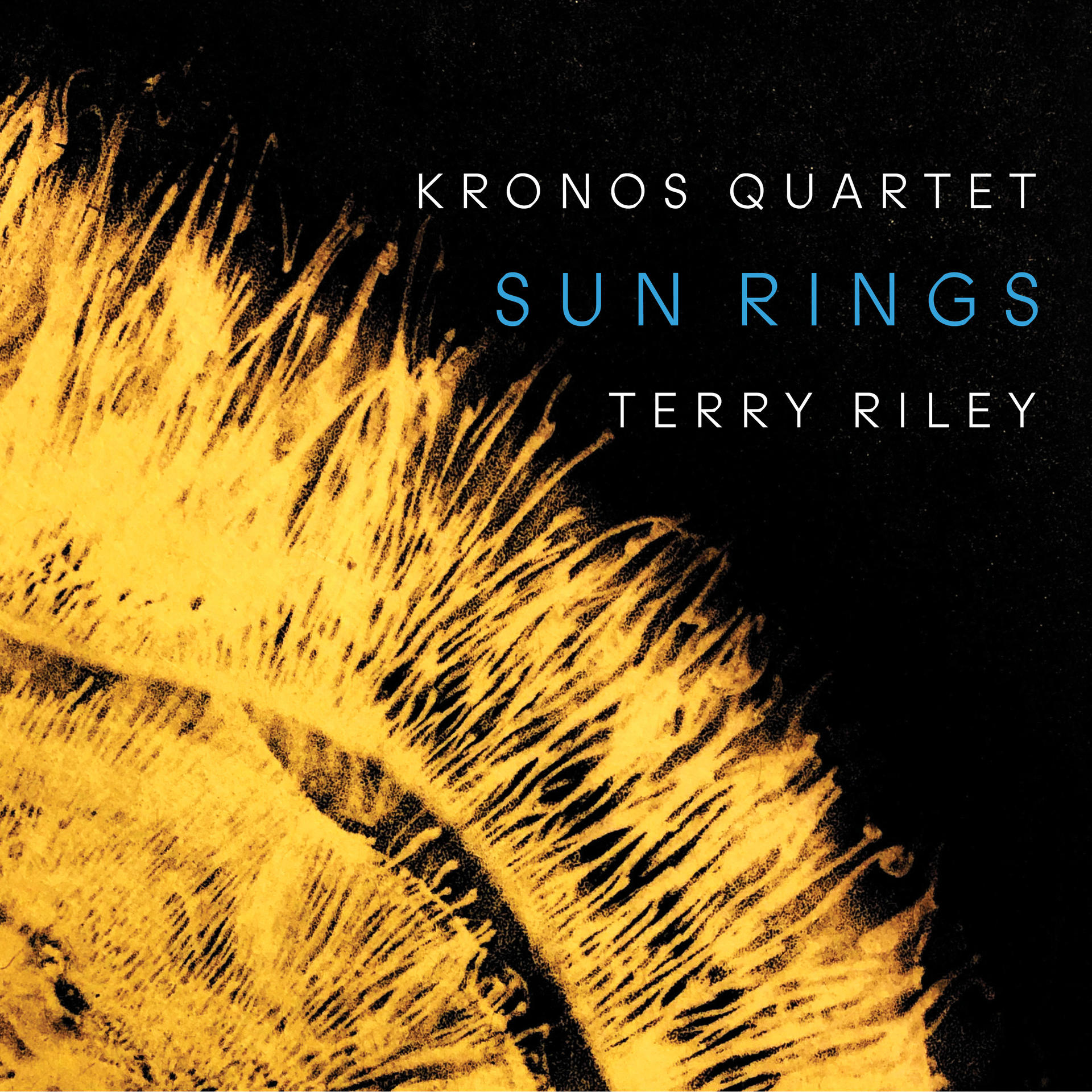 Pochette d'album. Forme jaune ensoleillée sur fond noir. Kronos Quartet, Sun Rings, Terry Riley.