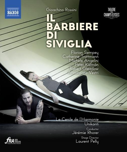 Albumcover mit Opernsängern, Text 'Il Barbiere di Siviglia'.