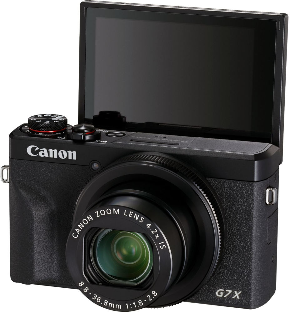 A black Canon camera with a screen open, on a white background.