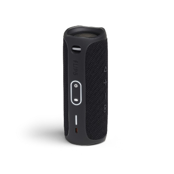 Altavoz Bluetooth cilíndrico negro. Tiene botones, luz de encendido y un logo.