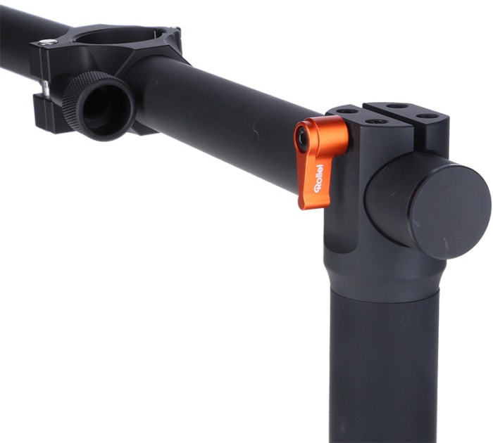 Black and orange Rollei camera stabilizer arm with clamp.