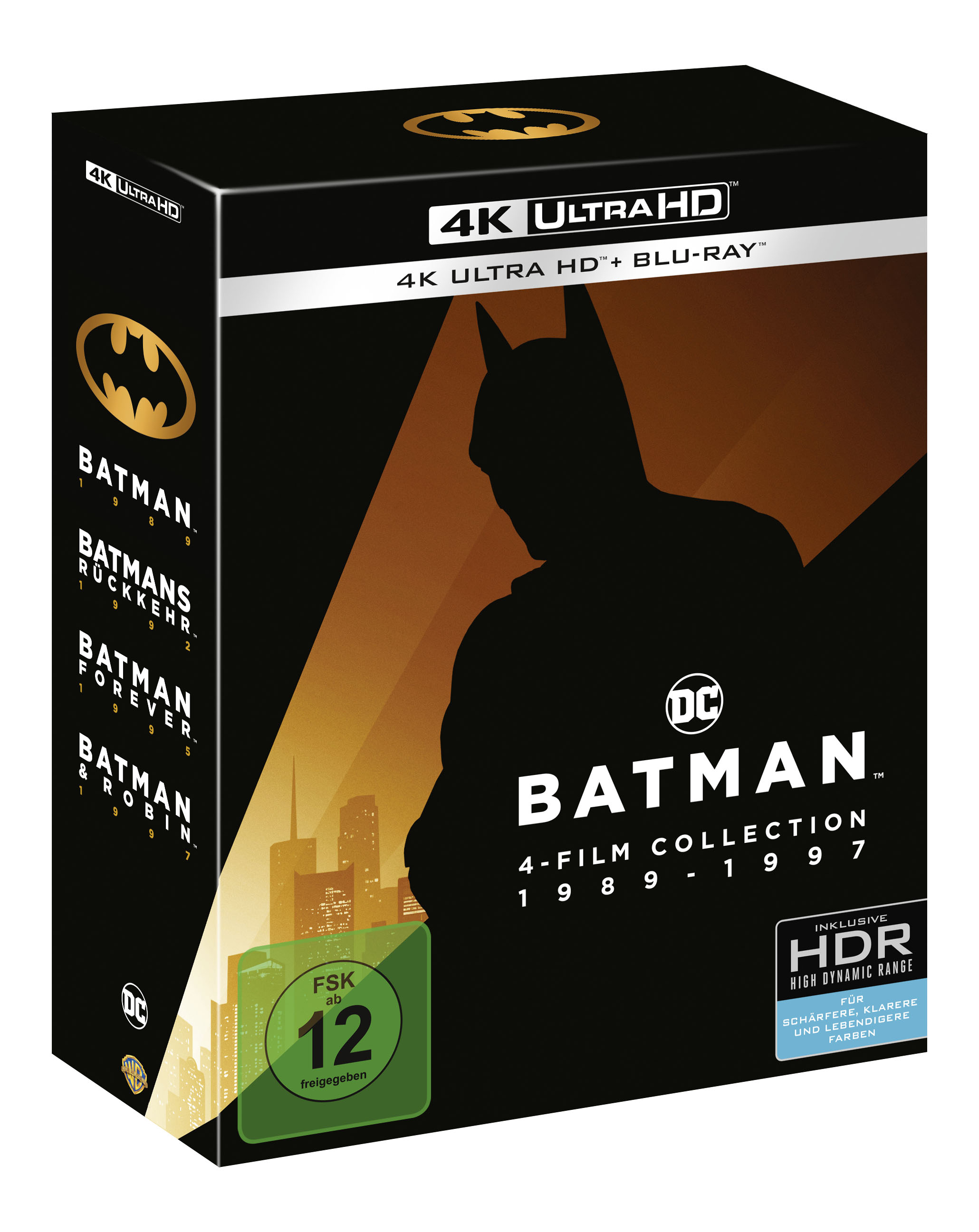 Eine Batman 4-Film-Sammlungsbox mit einer Silhouette von Batman und der Skyline der Stadt.