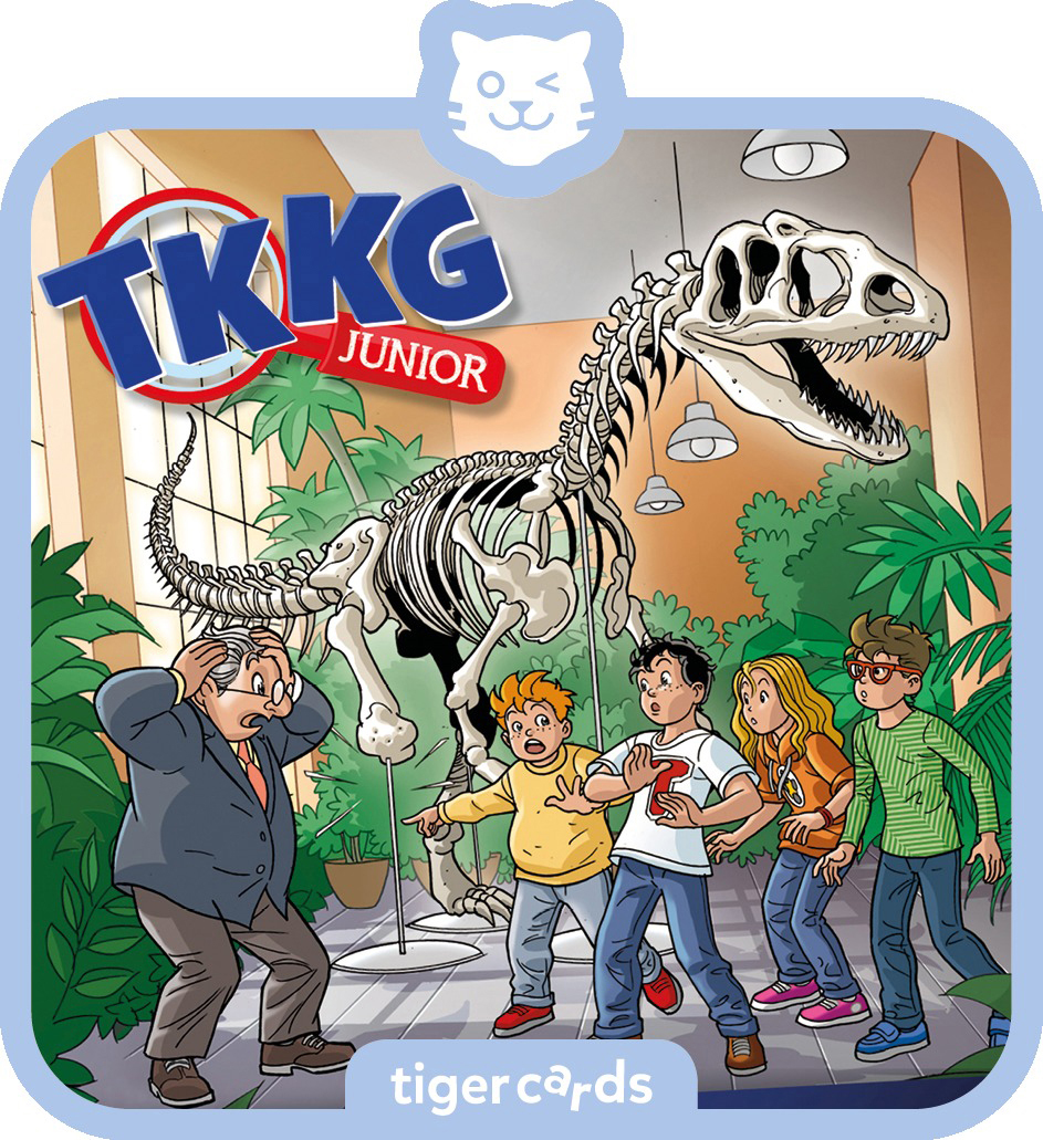 Skelett eines Dinosauriers im Museum mit Kindern und einem Erwachsenen.