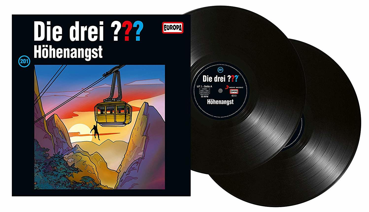 Albumcover mit Cartoon-Grafik, zwei schwarze Schallplatten sind sichtbar. Weißer Hintergrund.